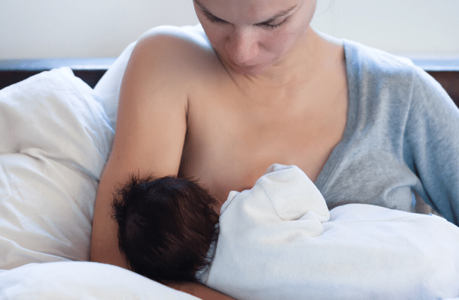 Mom breastfeeding baby- how to breastfeed successfully. Mother and baby love blog.