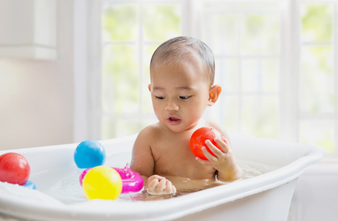 Playing in the bath tub- activities for kids.