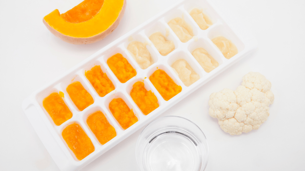 Ice cube tray with homemade baby food ideas - butternut squash and brocolli.